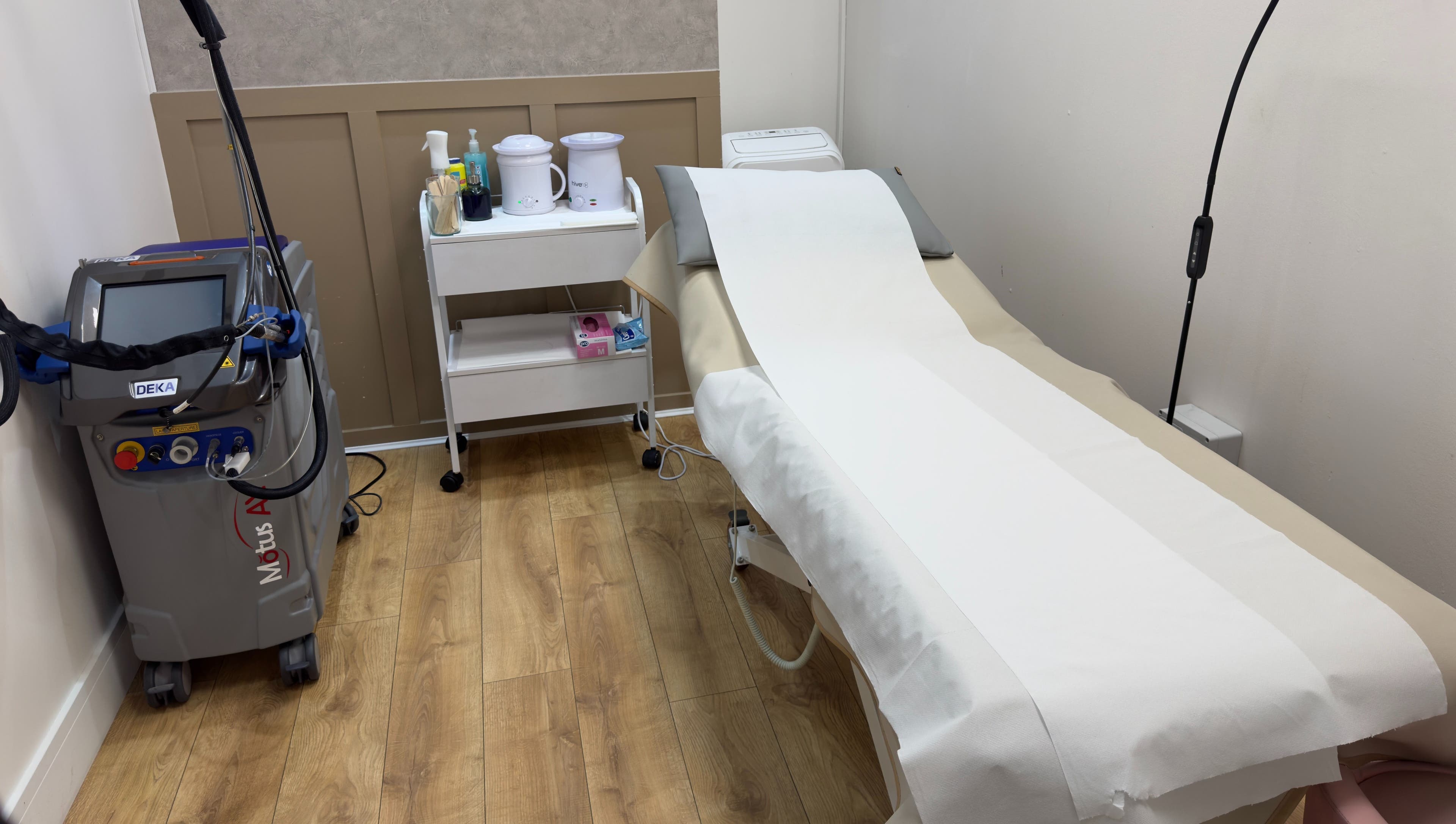 Treatment room at The Elite Wax Group Sheffield - Abbeydale Road, showing equipment and bed in Sheffield, England, GB.