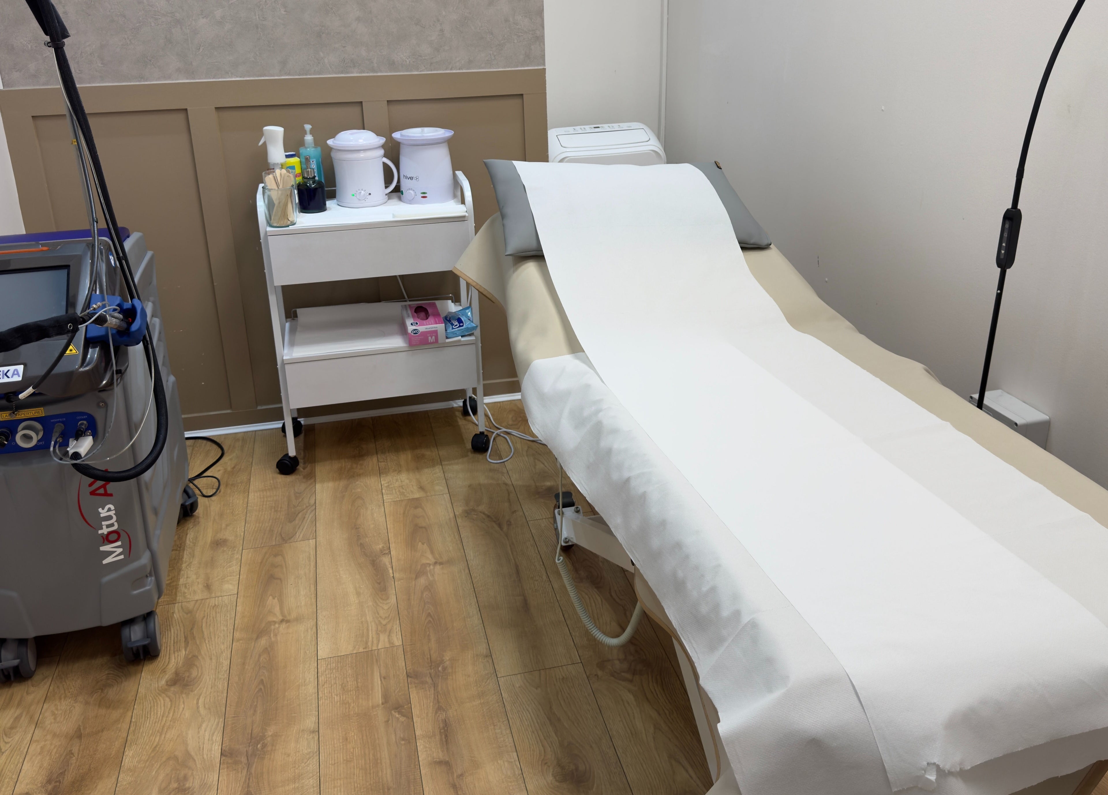 Treatment room at The Elite Wax Group Sheffield - Abbeydale Road, showing equipment and bed in Sheffield, England, GB.