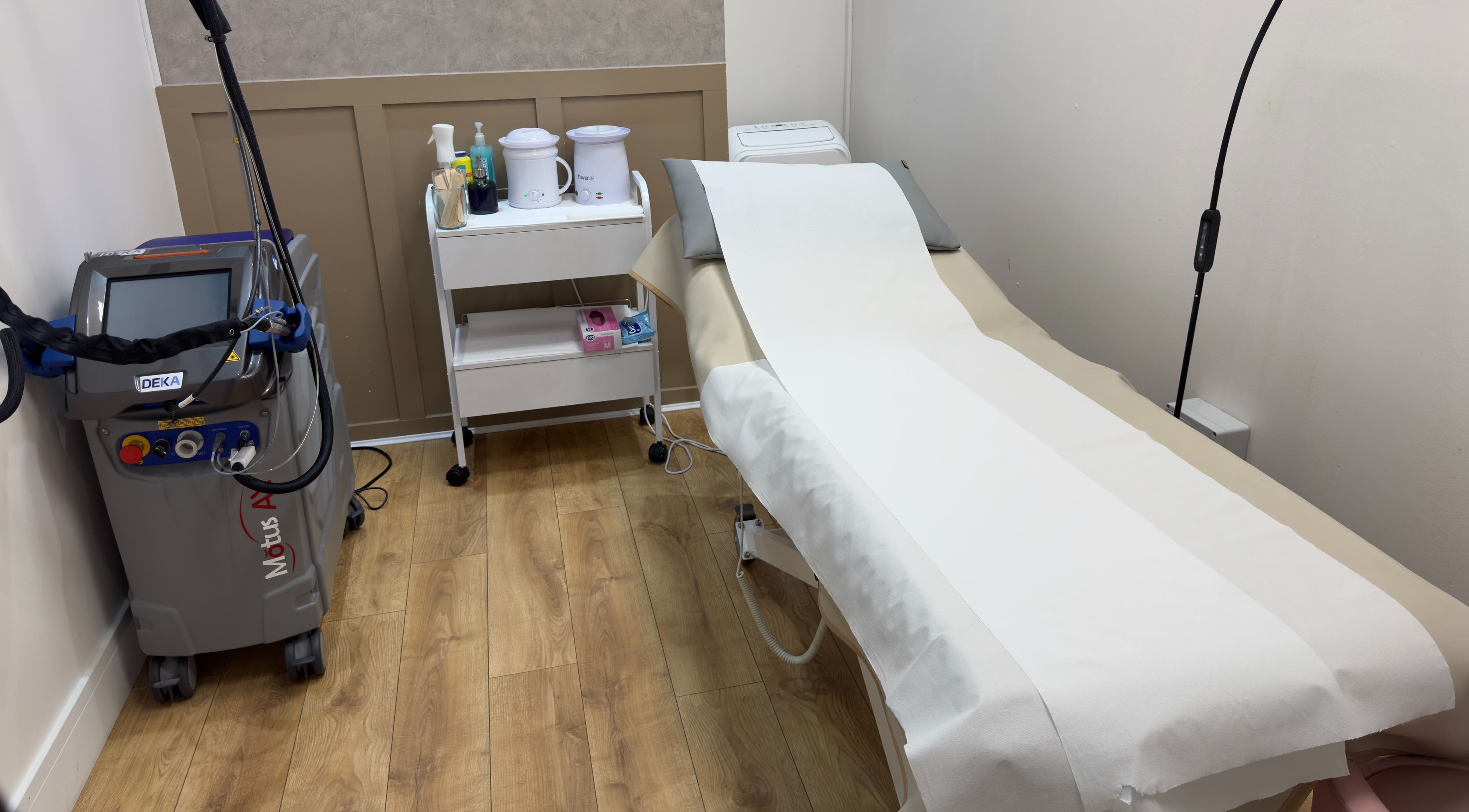 Treatment room at The Elite Wax Group Sheffield - Abbeydale Road, showing equipment and bed in Sheffield, England, GB.