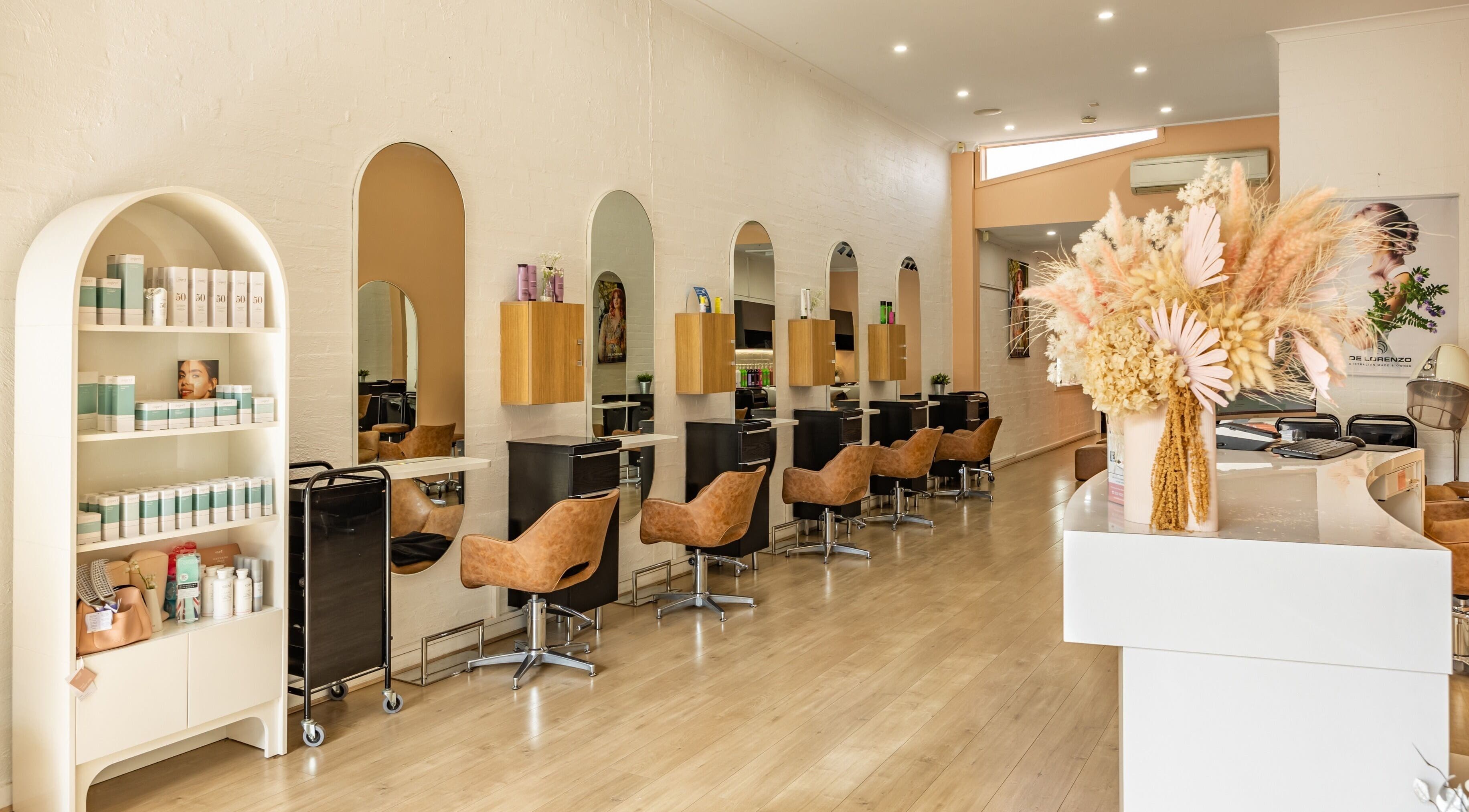 Interior of Volume Bloom Hair Studio in Eltham, Victoria, AU, showcasing chic seating and stylish decor.