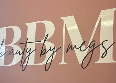 Beauty By Megs logo on a pink wall in Irlam, England, GB.