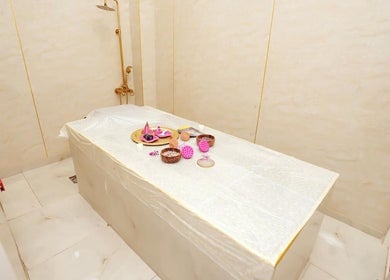 Luxurious massage therapy room at Dtangle Hair And Beauty Salon in Dubai, Dubai, AE, with serene decor.