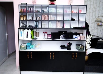 Products and shelves at Dtangle Hair And Beauty Salon, Dubai, Dubai, AE for hair and beauty care.