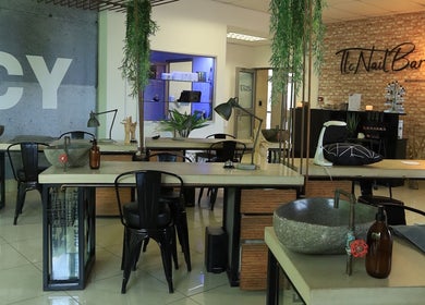 Modern interior of TLC Nail Bar in Germiston, Gauteng, ZA with stylish decor and nail care stations.