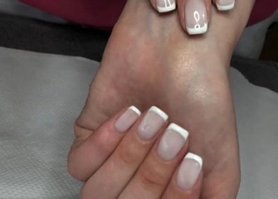 Elegant French manicure and pedicure at TLC Nail Bar in Germiston, Gauteng, ZA.