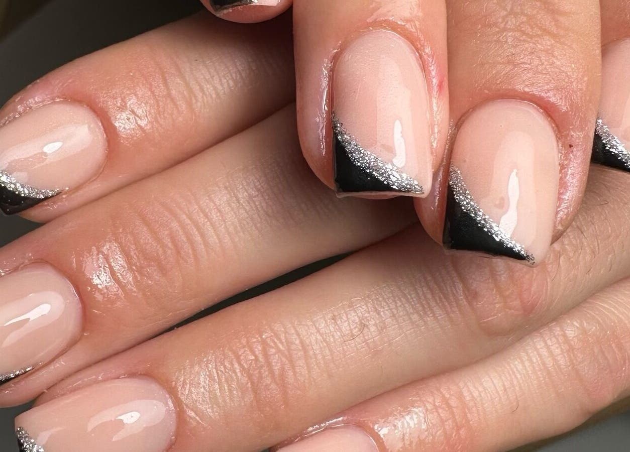Elegant nail design with black and silver tips by By Jay Studio in Wigan, England, GB.
