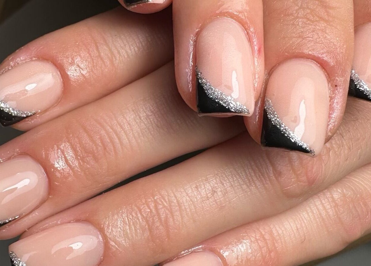 Elegant nail design with black and silver tips by By Jay Studio in Wigan, England, GB.