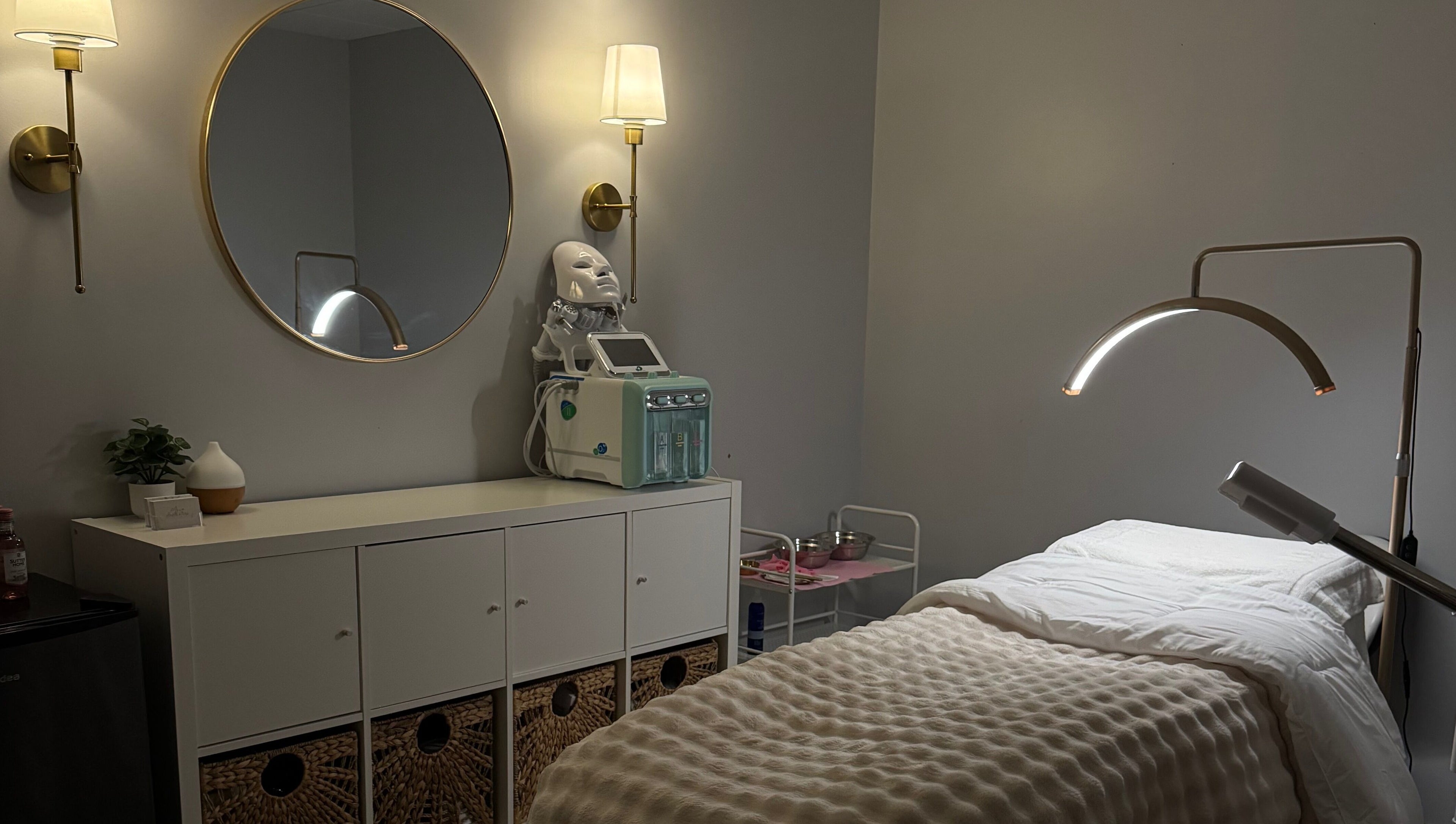 Serene treatment room at Mina Aesthetics in North Bethesda, Maryland, US with relaxing lighting.