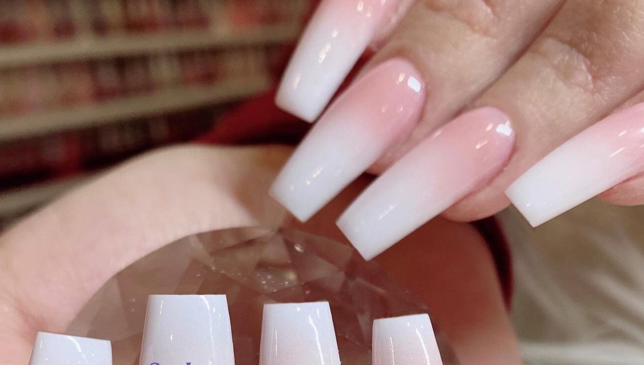Elegant manicure with white gradient nails at SpaLicious Nail Bar, Lancaster, Pennsylvania, US.