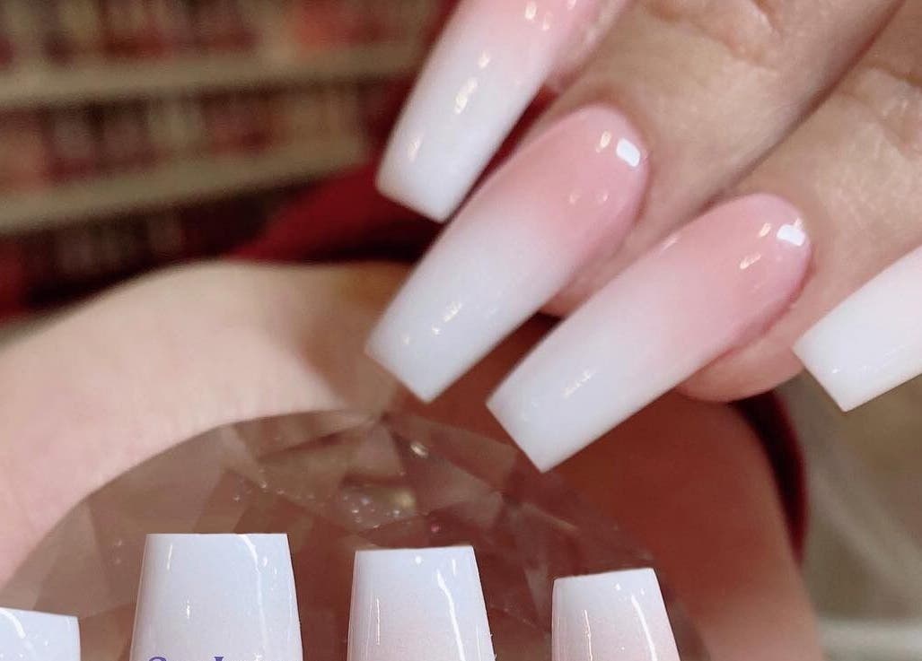 Elegant manicure with white gradient nails at SpaLicious Nail Bar, Lancaster, Pennsylvania, US.