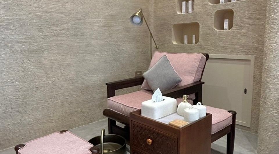 Relaxation area at Sonaz Beauty Salon, Dubai, Dubai, AE, featuring a plush chair and spa essentials.