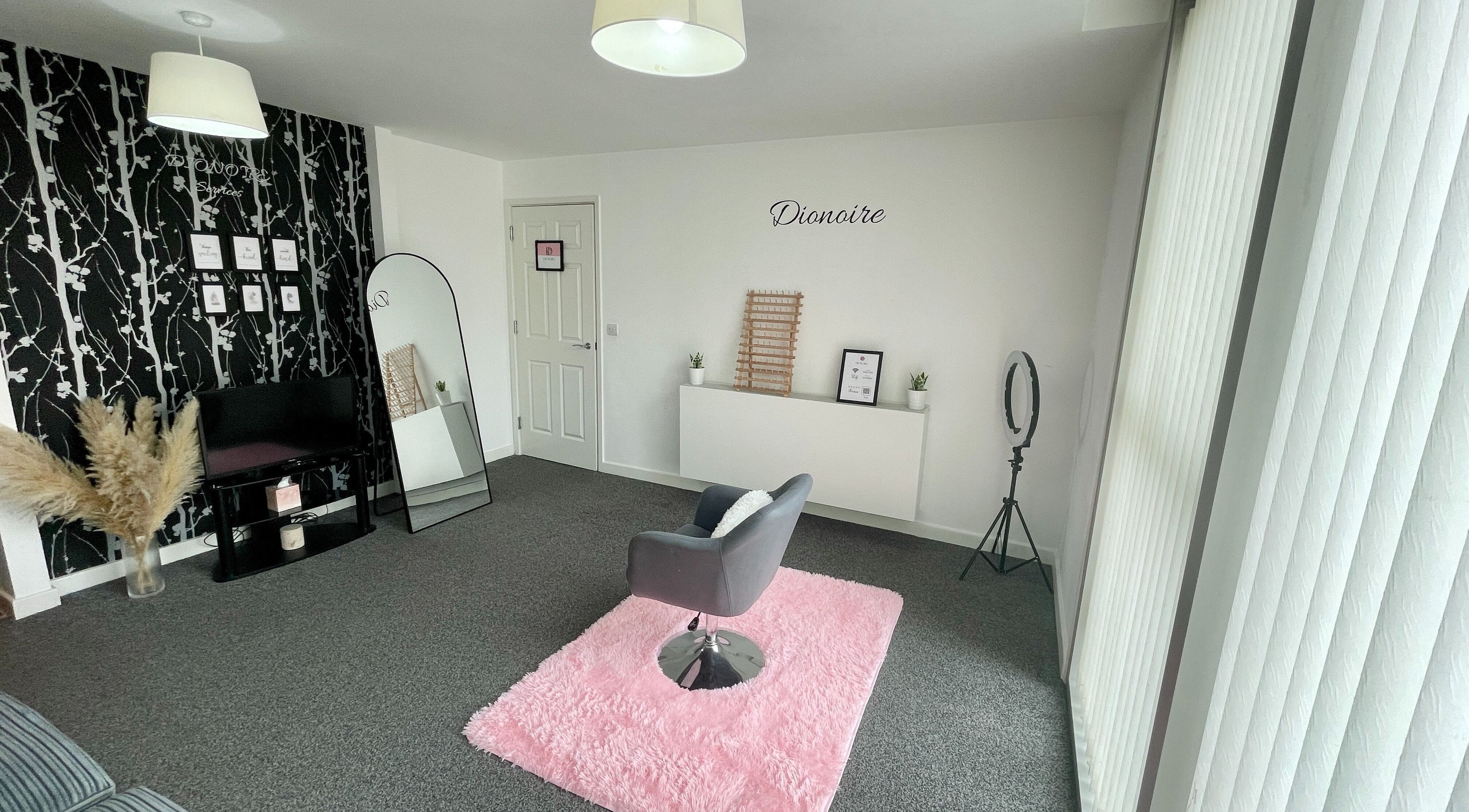 Modern beauty studio at Dionoire, MILTON KEYNES, England, GB with chic décor and styling chair.