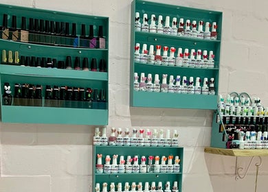 Vibrant nail polish display at Lindels Nail Bar in Cape Town, Western Cape, ZA showcasing diverse color options.