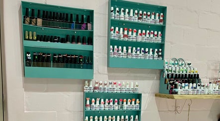Vibrant nail polish display at Lindels Nail Bar in Cape Town, Western Cape, ZA showcasing diverse color options.