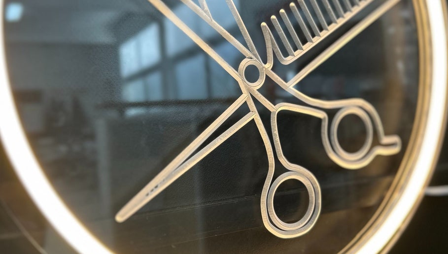 Stylish scissors and comb logo at Time to Shine Hair Salon, Toi Ohomai - Mokoia, Rotorua, Bay of Plenty, NZ.