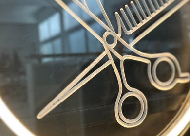 Stylish scissors and comb logo at Time to Shine Hair Salon, Toi Ohomai - Mokoia, Rotorua, Bay of Plenty, NZ.