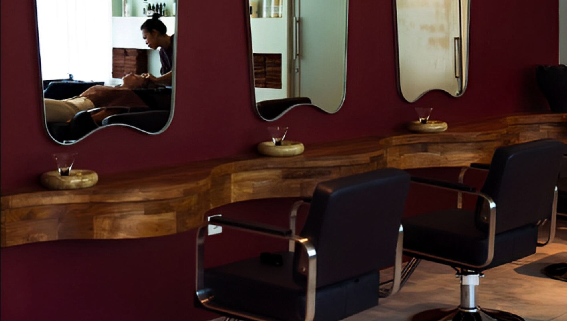 Stylish salon interior at Darlings, featuring modern chairs and mirrors in Bali, Bali, ID.
