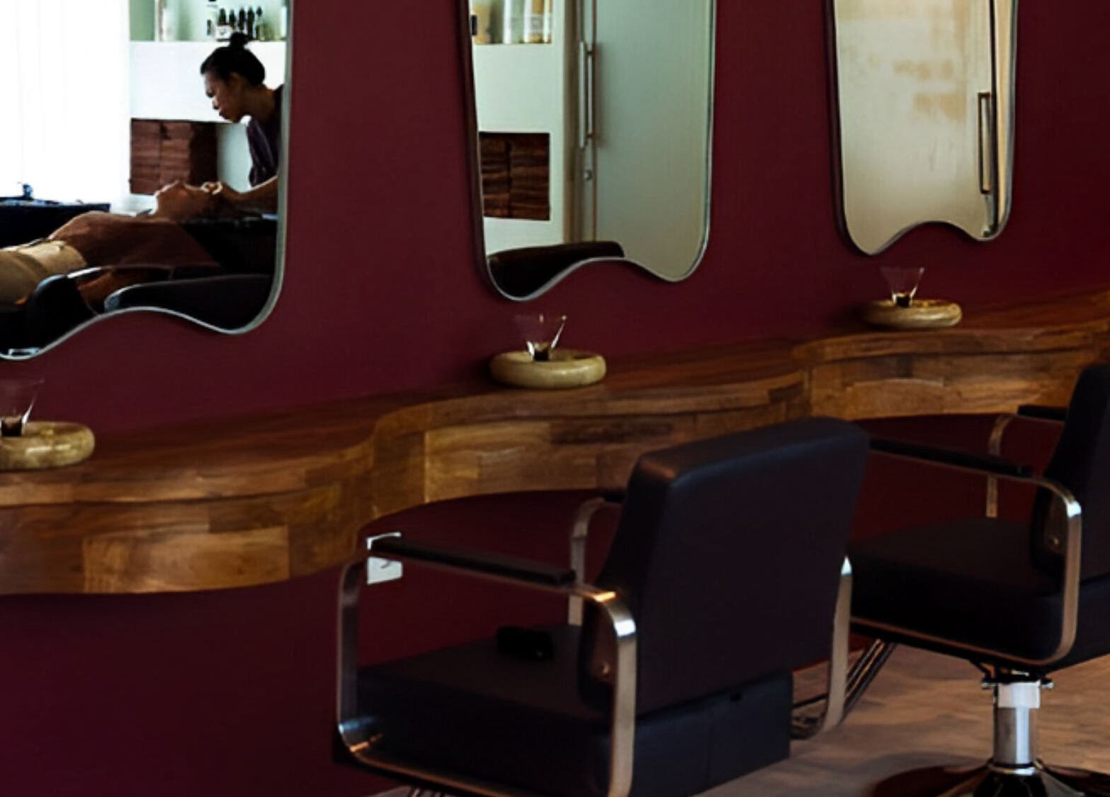 Stylish salon interior at Darlings, featuring modern chairs and mirrors in Bali, Bali, ID.