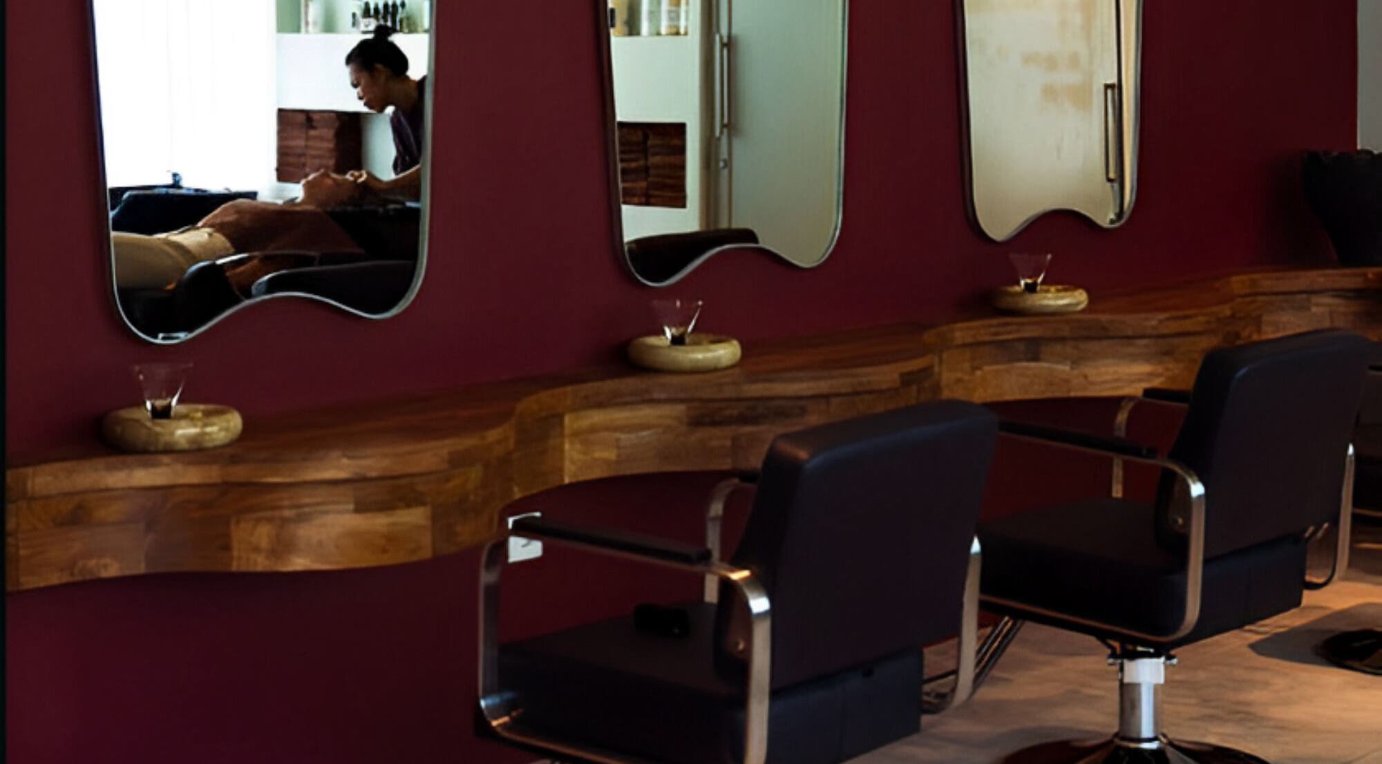 Stylish salon interior at Darlings, featuring modern chairs and mirrors in Bali, Bali, ID.