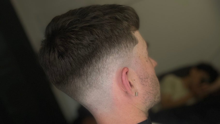 Close-up of a stylish fade haircut at Barber Jake, Motueka, Tasman, NZ showcasing expert barber skills.