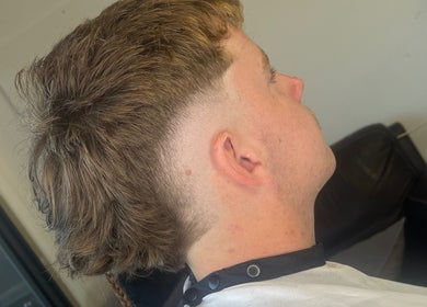 Side view of a fresh fade haircut at Barber Jake, Motueka, Tasman, NZ, featuring precise styling.