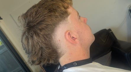 Side view of a fresh fade haircut at Barber Jake, Motueka, Tasman, NZ, featuring precise styling.