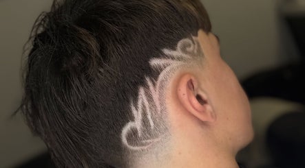 Detailed fade haircut design at Barber Jake, Motueka, Tasman, NZ showcases artistic barbering skills.