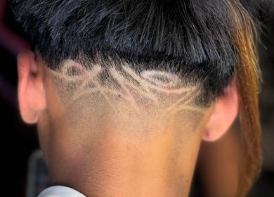 Close-up of creative hair design at Barber Jake, Motueka, Tasman, NZ showcasing intricate patterns.