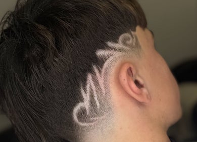 Close-up of hair with intricate fade design at Barber Jake, Motueka, Tasman, NZ.