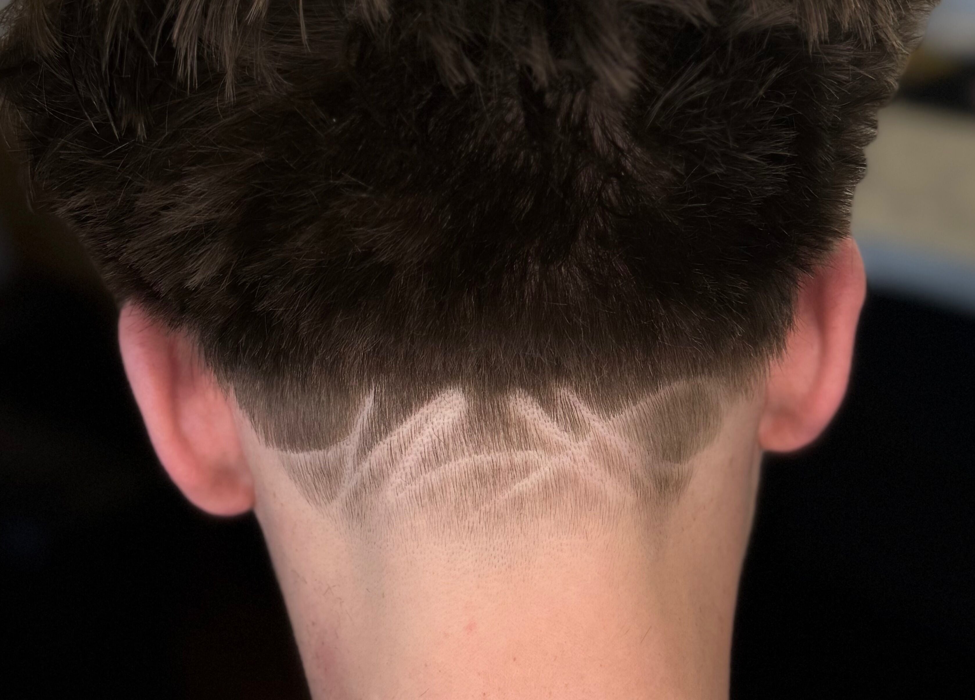 Close-up of an artistic fade haircut at Barber Jake in Motueka, Tasman, NZ.