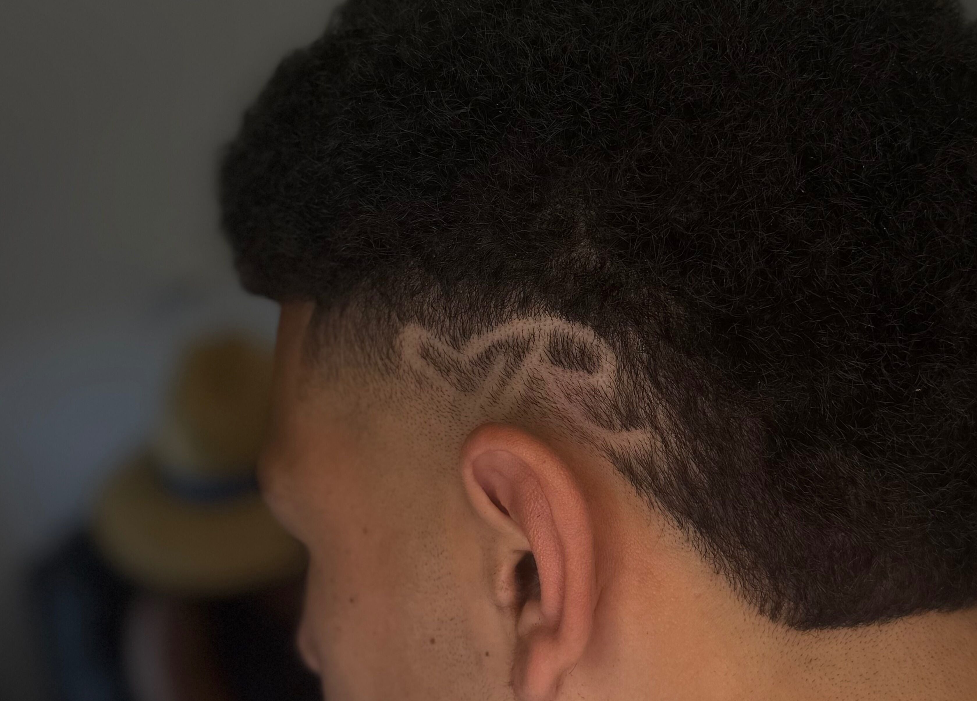 Detailed haircut design at Barber Jake in Motueka, Tasman, NZ showcasing artistic patterns.
