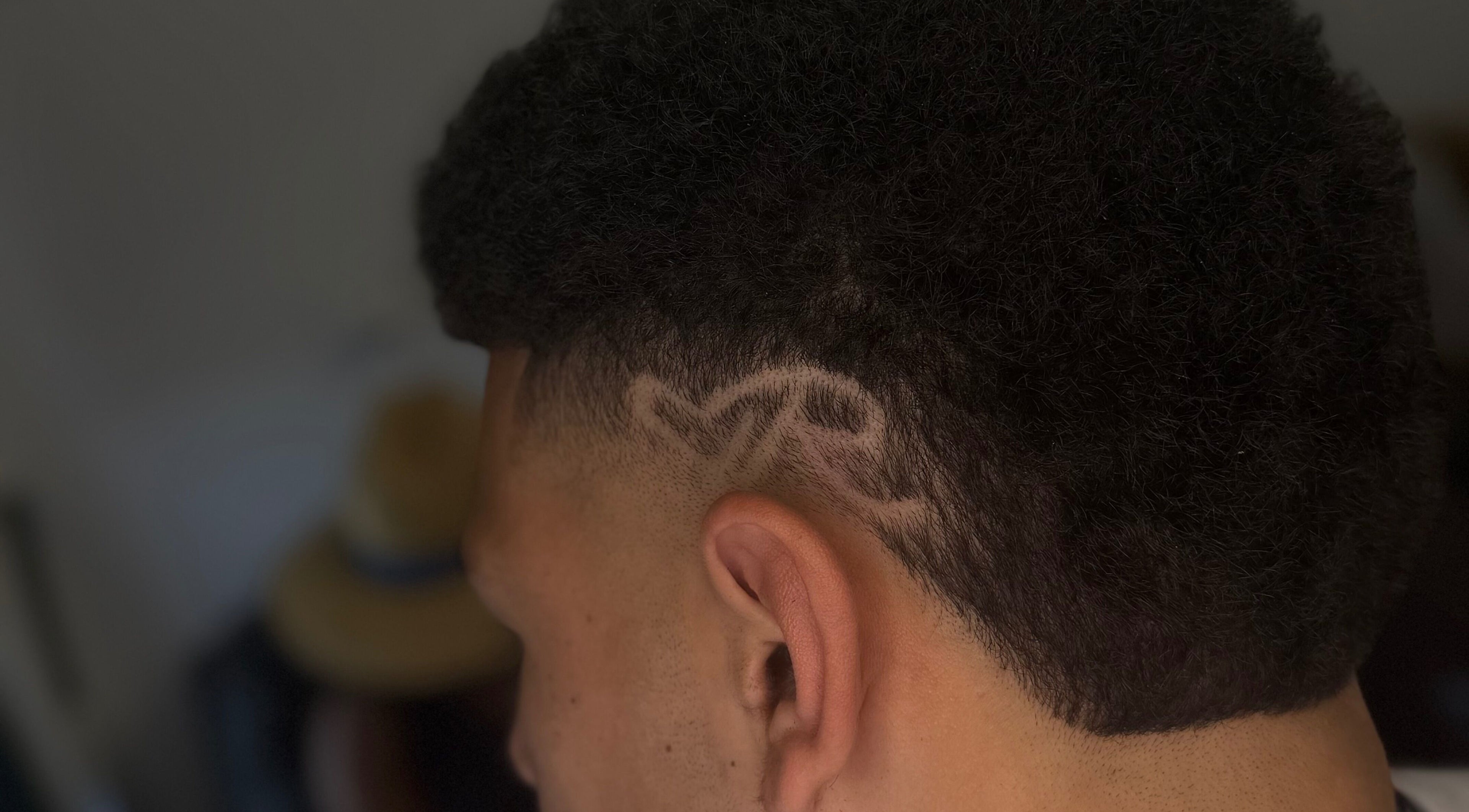 Detailed haircut design at Barber Jake in Motueka, Tasman, NZ showcasing artistic patterns.