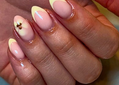 Elegant French tips manicure with nail art from Beauty by Livv, Burnley, England, GB.