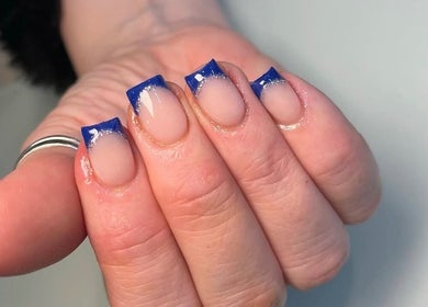 Stylish blue-accent nails at Beauty by Livv, Burnley, England, GB. Perfect for a chic look.