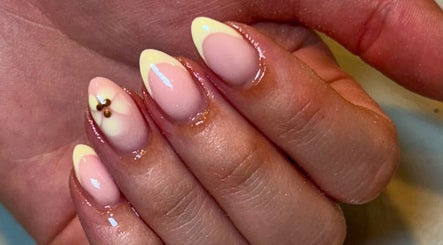 Stylish nail art featuring soft pink and yellow at Beauty by Livv, Burnley, England, GB for a chic look.