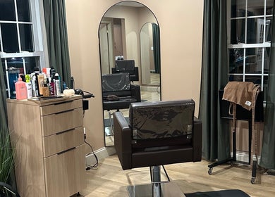 Stylish salon chair and mirror at Heather Schreiber, Niagara Falls, New York, US.
