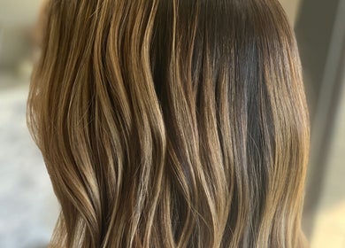 Elegant wavy hair style at Heather Schreiber in Niagara Falls, New York, US.
