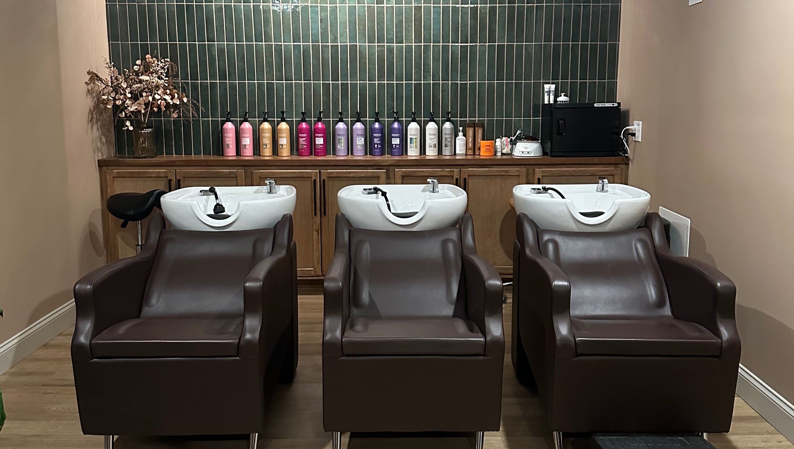 Modern salon wash stations at Heather Schreiber, Niagara Falls, New York, US with elegant design.