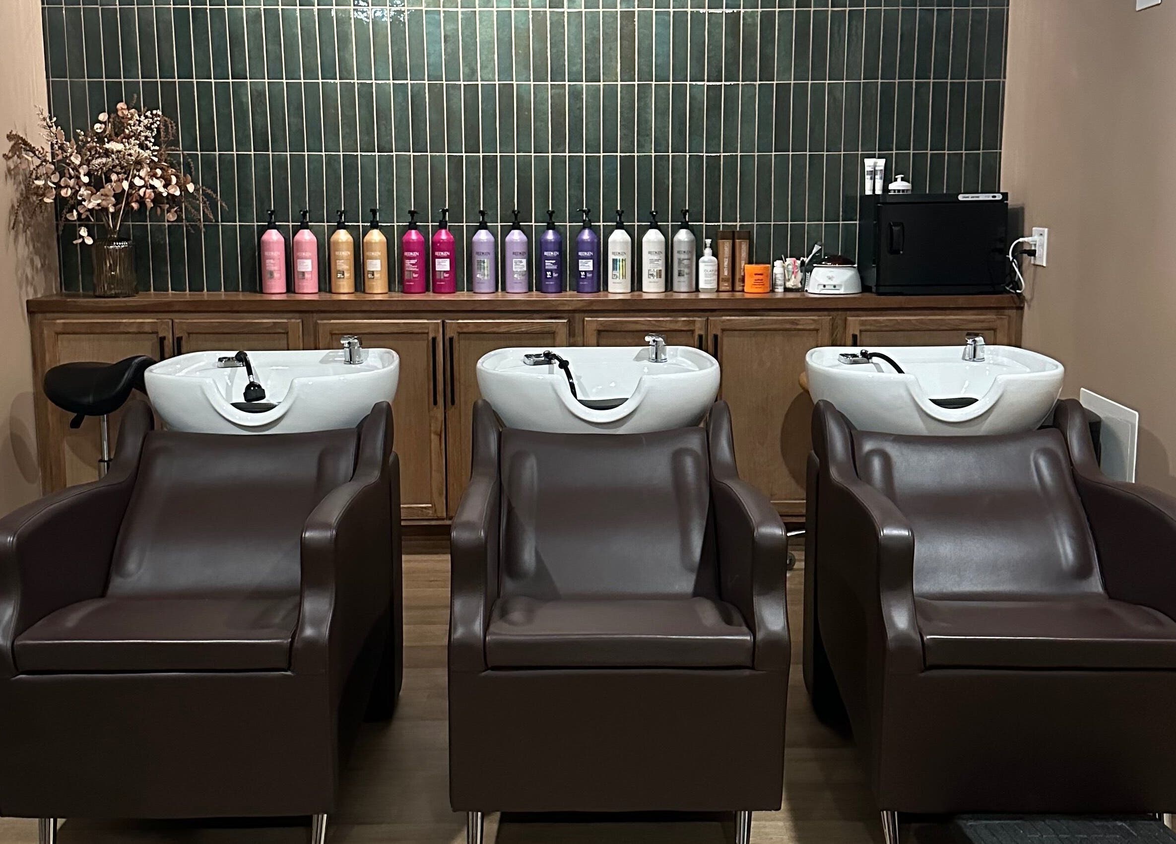 Modern salon wash stations at Heather Schreiber, Niagara Falls, New York, US with elegant design.