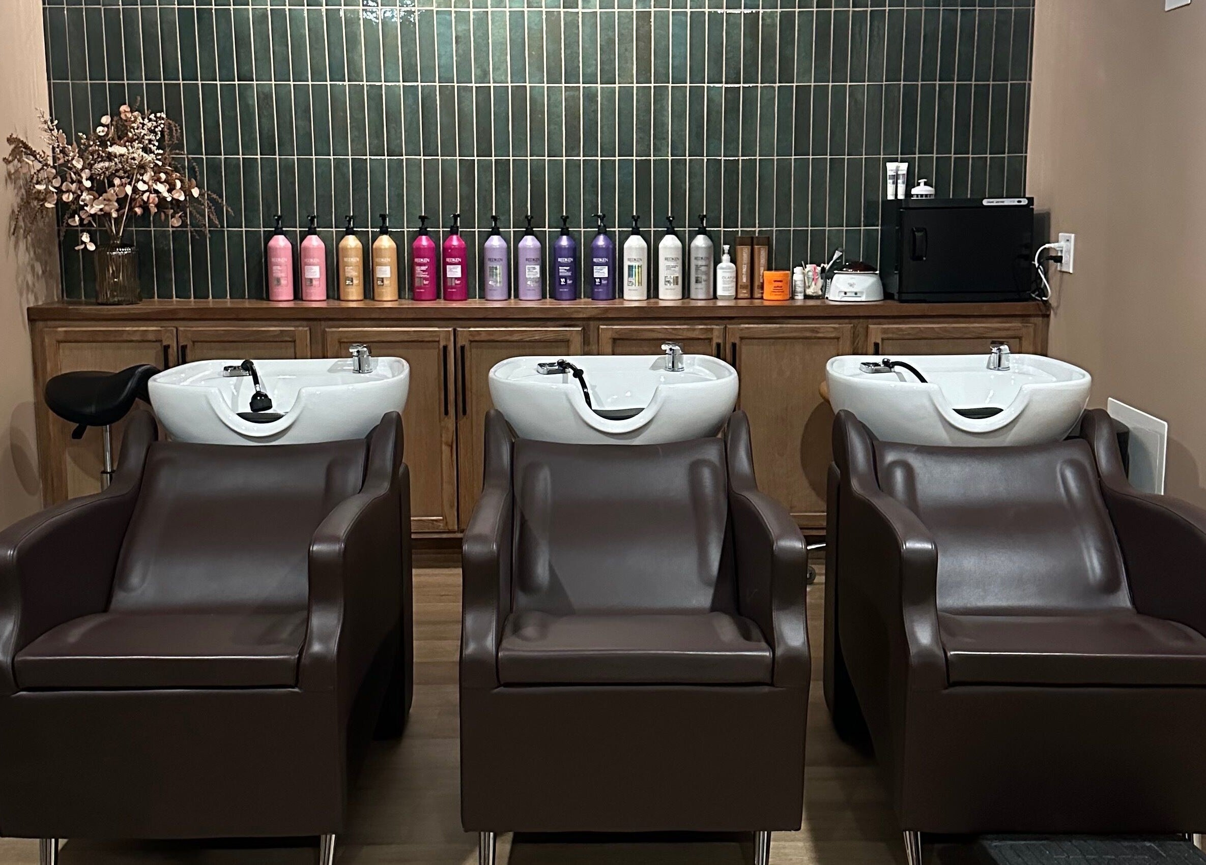 Modern salon wash stations at Heather Schreiber, Niagara Falls, New York, US with elegant design.
