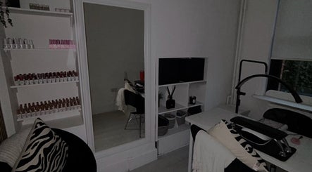 Elegant interior of Zo Nails in Dublin, County Dublin, IE showcasing a stylish nail station and organized shelves.