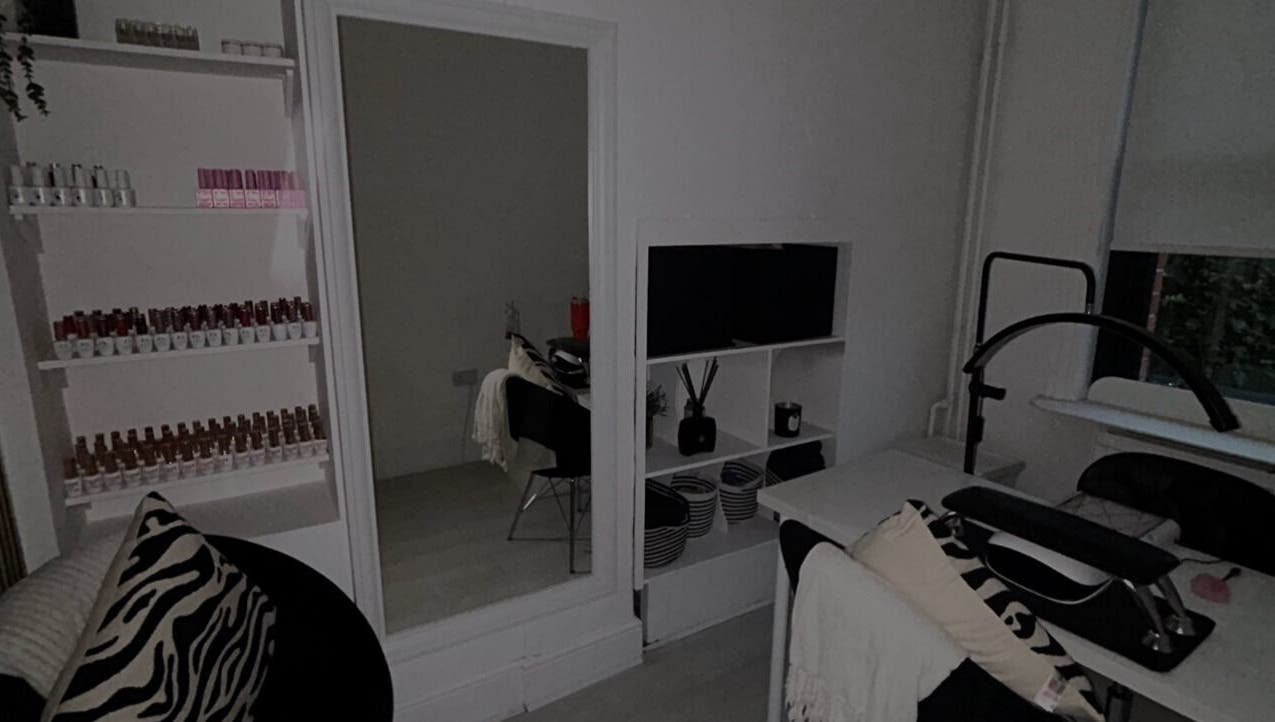 Interior view of Zo Nails, featuring chic decor and product shelves in Dublin, County Dublin, IE.