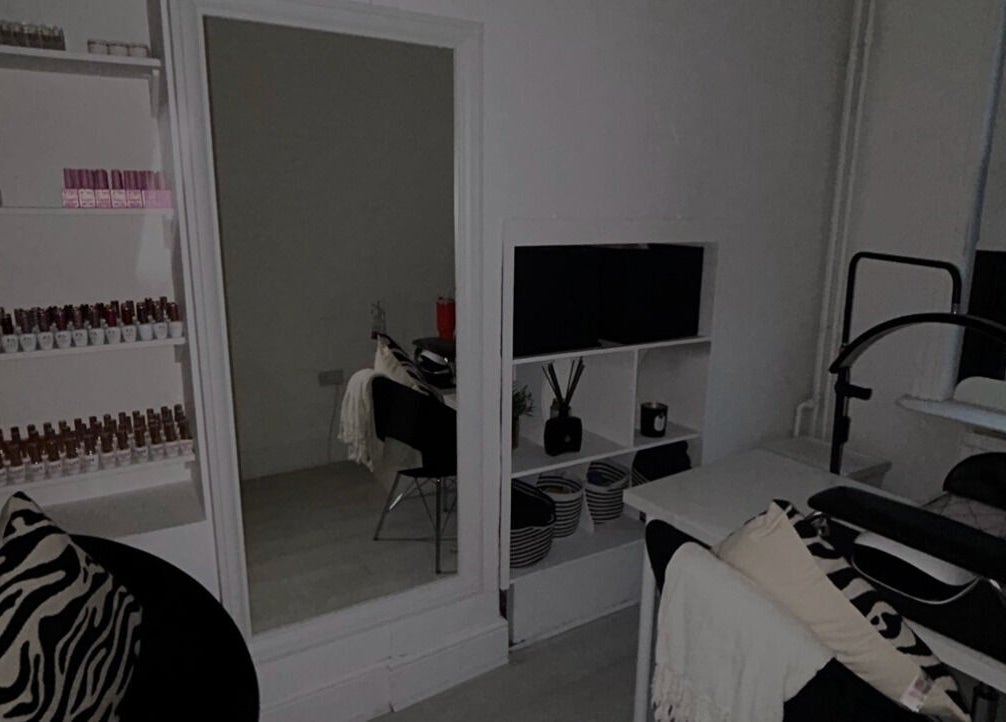 Interior view of Zo Nails, featuring chic decor and product shelves in Dublin, County Dublin, IE.