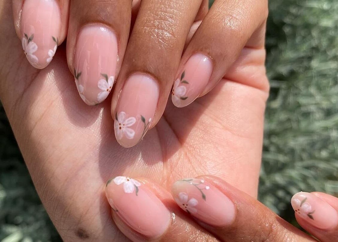 Floral nail art at Complete Nails by Kristie, Lethabong, Gauteng, ZA showcasing delicate flower designs.