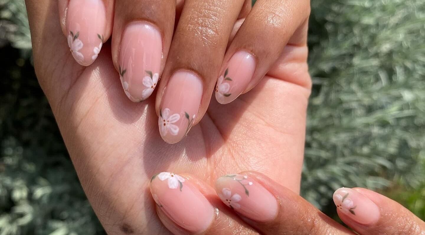 Floral nail art at Complete Nails by Kristie, Lethabong, Gauteng, ZA showcasing delicate flower designs.