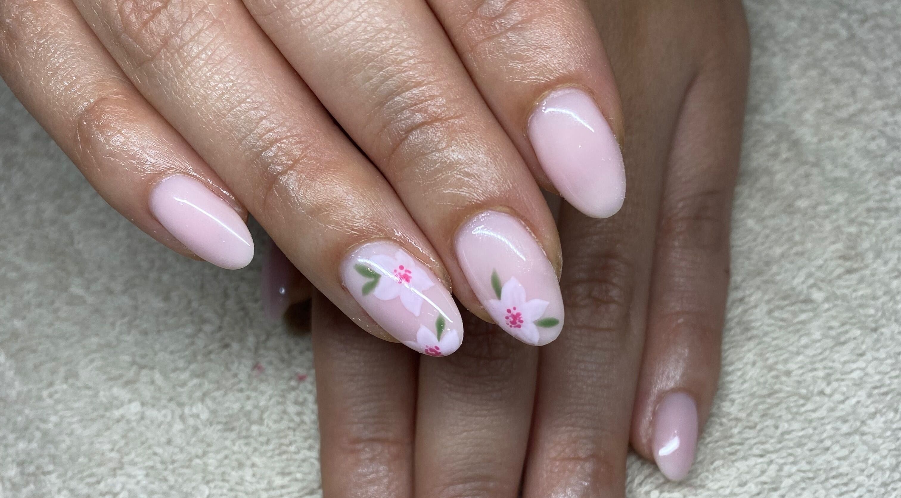 Elegant floral nail art at Complete Nails by Kristie, Lethabong, Gauteng, ZA showcasing pastel pink designs.