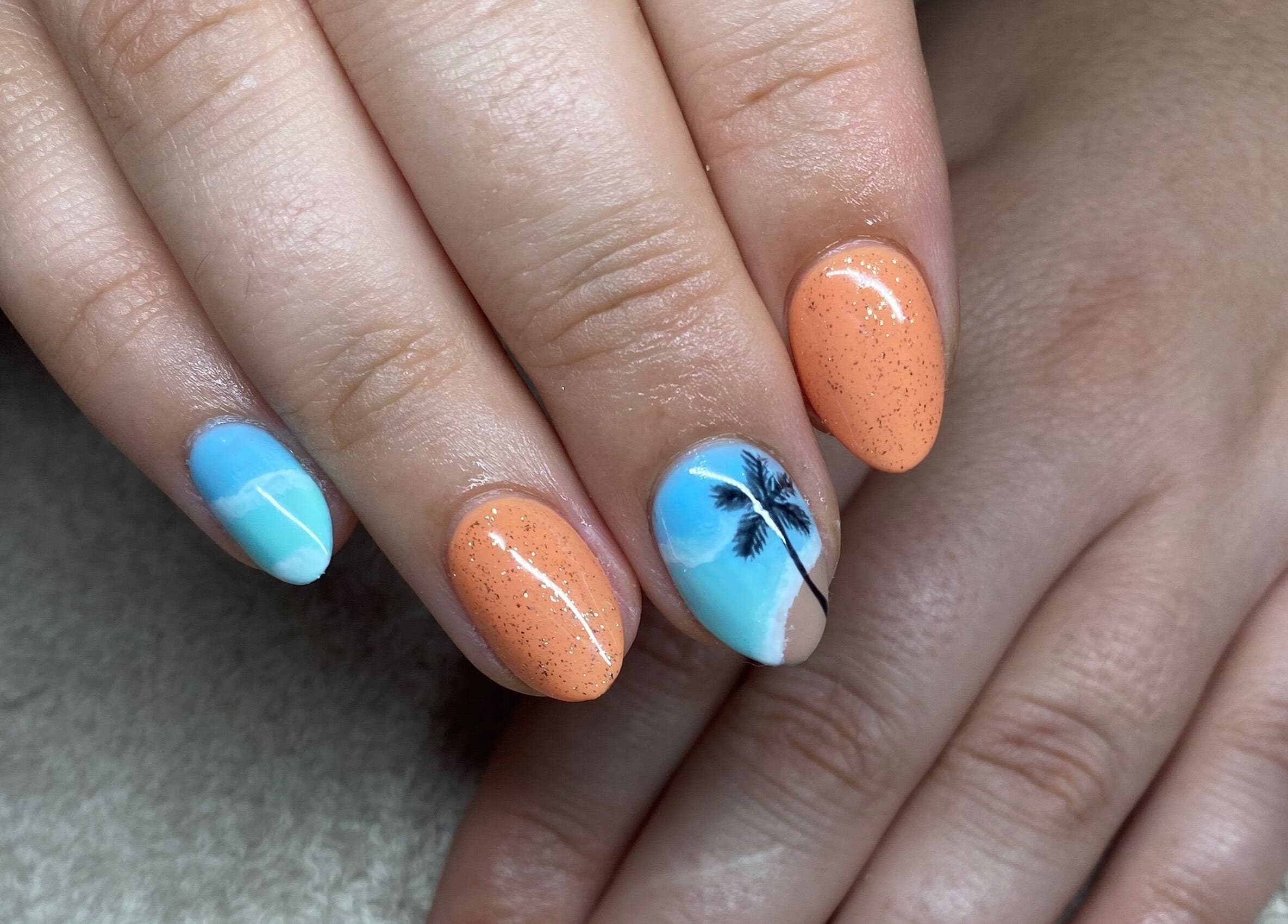 Tropical nail art at Complete Nails by Kristie in Lethabong, Gauteng, ZA with palm and orange designs.