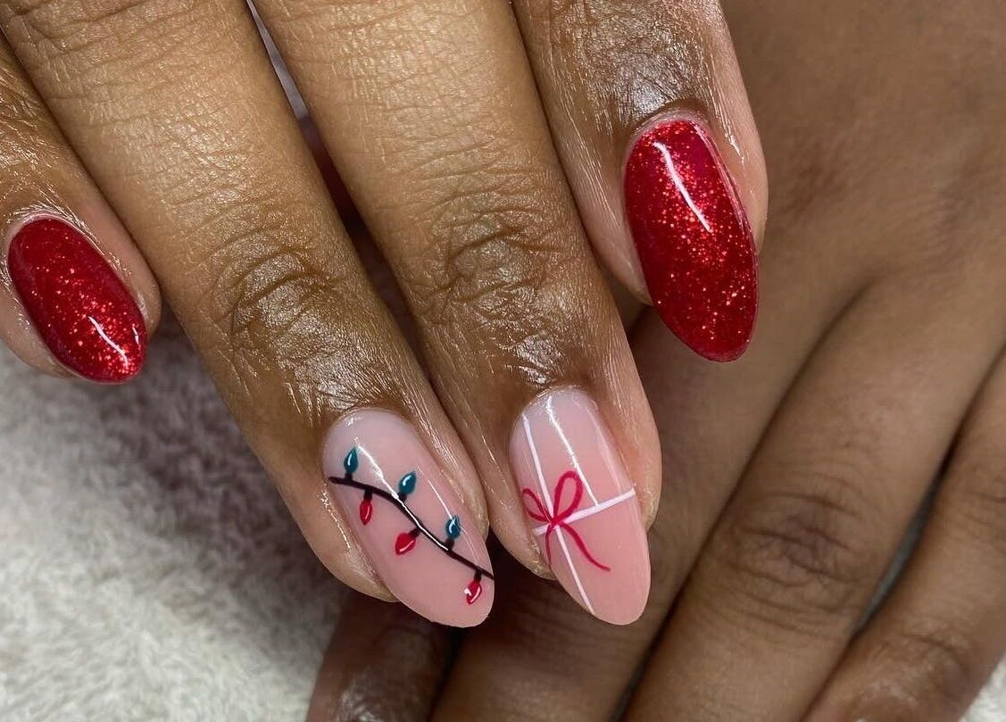 Festive red glitter and holiday designs at Complete Nails by Kristie, Lethabong, Gauteng, ZA.
