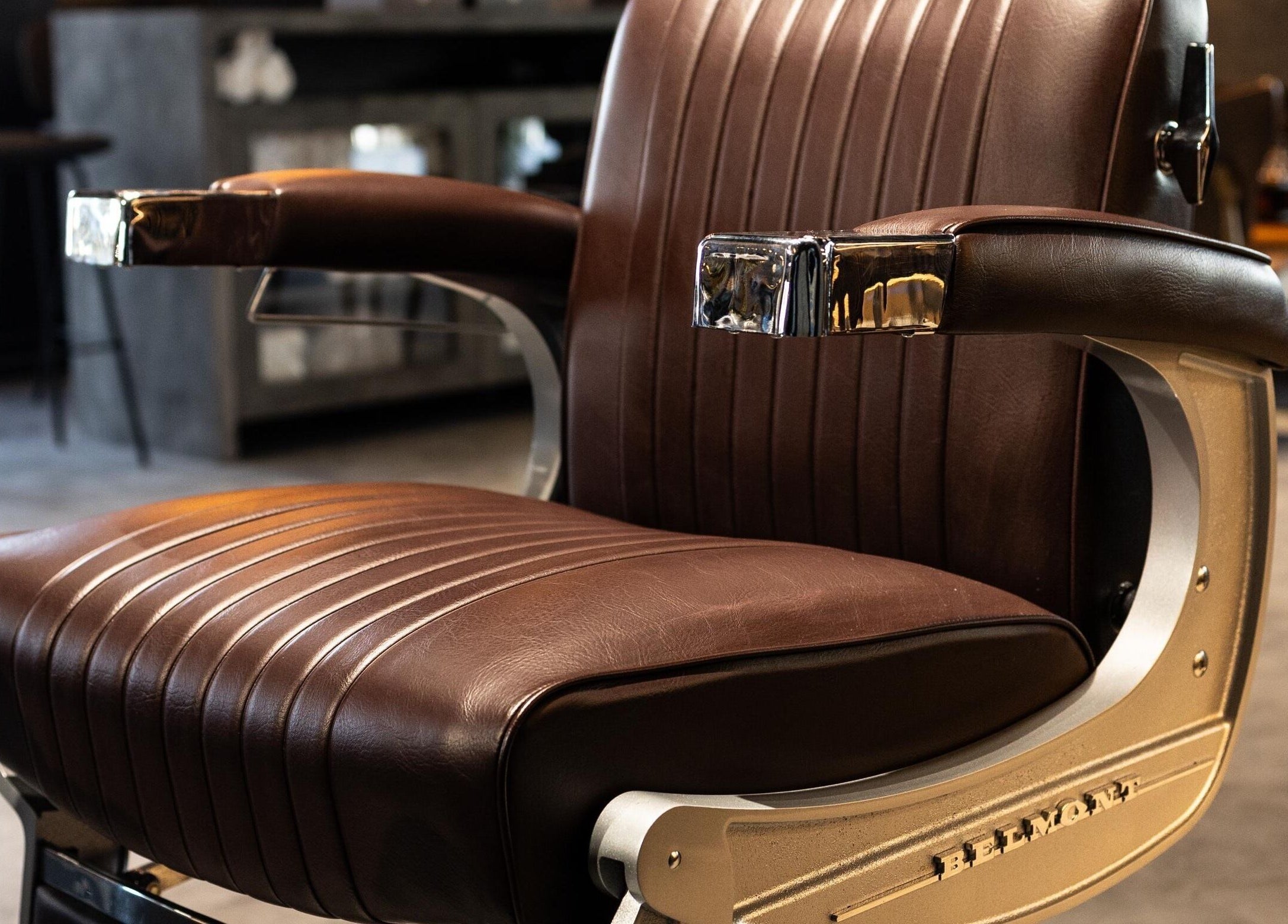 Elegant barber chair at Stache & Co. Barbershop - Reem Central Park, Abu Dhabi, Abu Dhabi, AE.