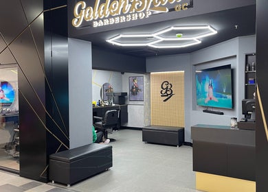Interior of Goldenblade GC Barbershop in Surfers Paradise, Queensland, AU showcasing modern design and luxurious setup.